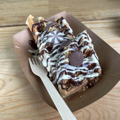 The Van Waffle Company Waffles with a Millionaire's Shortbread topping in a cardboard tray